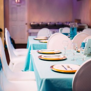Blue and white formal event table settings